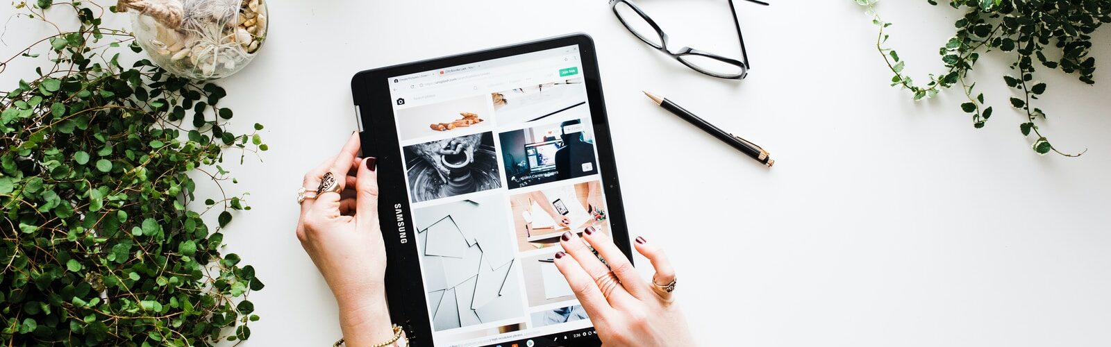 person using black tablet computer